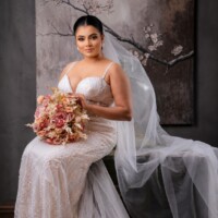 moody bridal portrait with blossoms