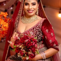 radiant bride in burgundy and gold